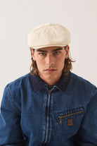 Unisex Brood Newsboy Cap in the color Egret White - Men's Front View