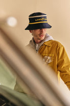 Men's Goodyear Slick Windbreaker in the color Nugget Gold - Additional Fit image