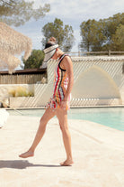 Women's Ribbed Cinch Mini Dress in the color Peach Cobbler Multi Stripe - Women's Lifestyle image