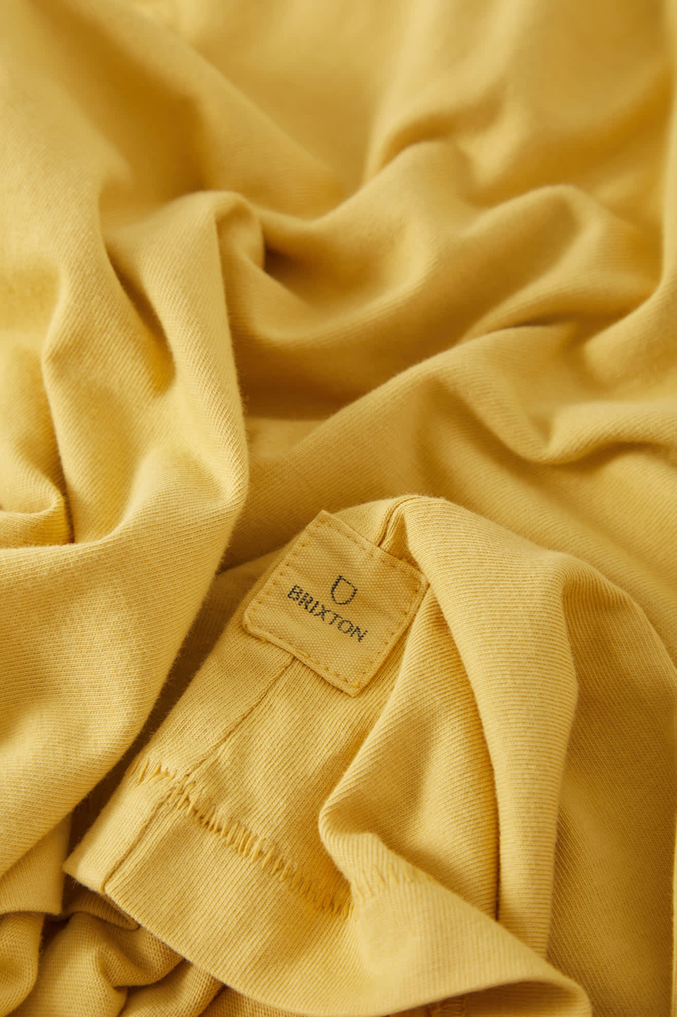 Men's Brixton Baseline Pocket T-Shirt in the color Dusted Ochre Vintage Wash - Additional Laydown image