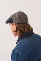 Unisex Hooligan Flat Cap in the color Navy/Sand Houndstooth - Additional Fit image