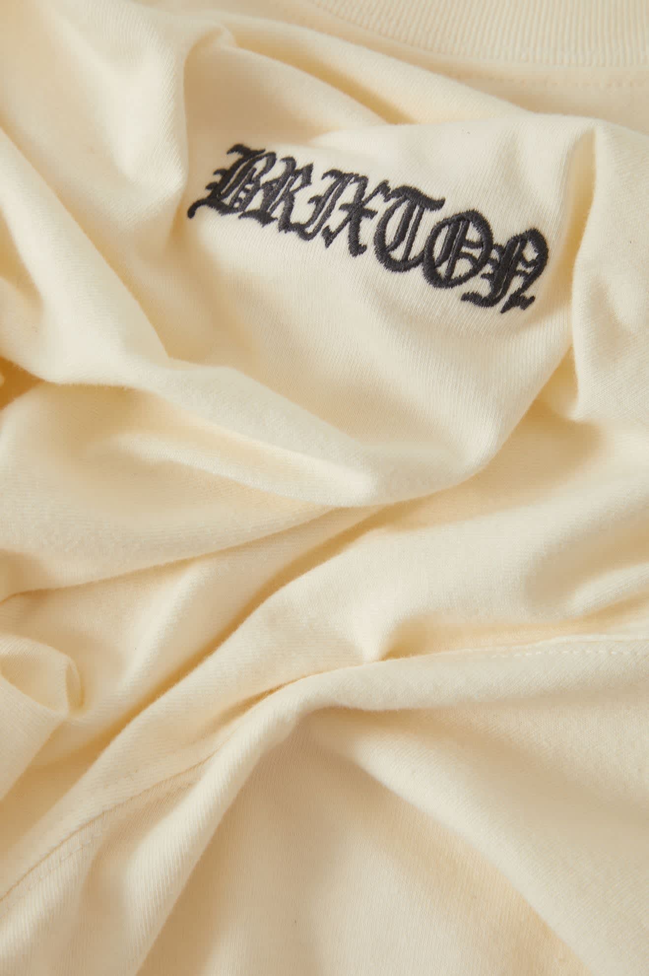 Men's Serrano Short Sleeve Boxed Crop T-Shirt in the color Cream - Additional Laydown image