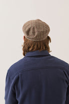 Unisex Fiddler Fisherman Cap in the color Brown/Tan/Red Plaid - Men's Back View