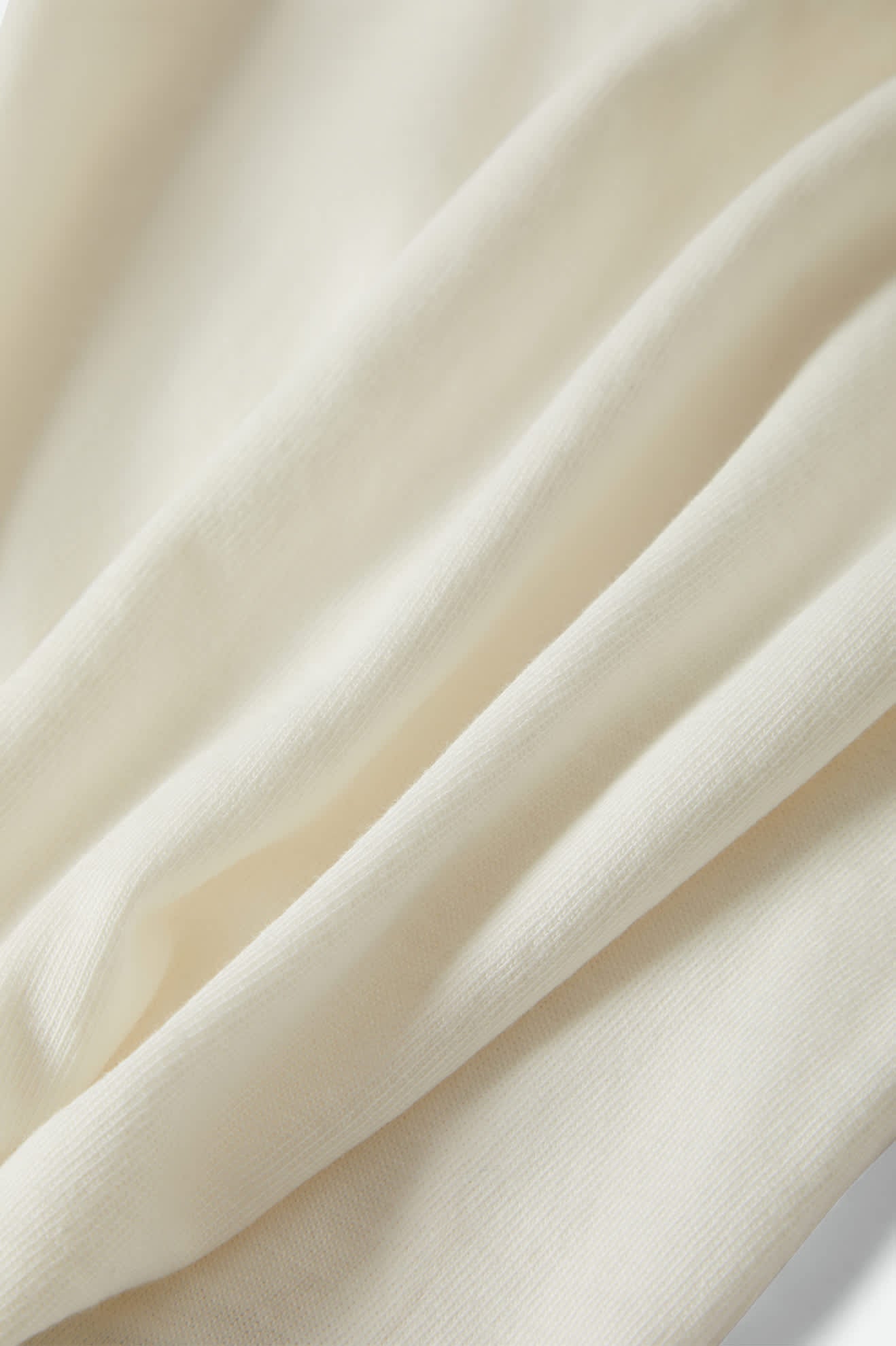 Women's Carefree Organic Garment Dye Slim L/S T-Shirt in the color Off White - Additional Laydown image