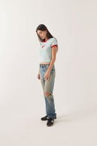 Women's Lucky In Love Baby T-Shirt in the color Sea Grass/Adrenaline Red - Women's Side View