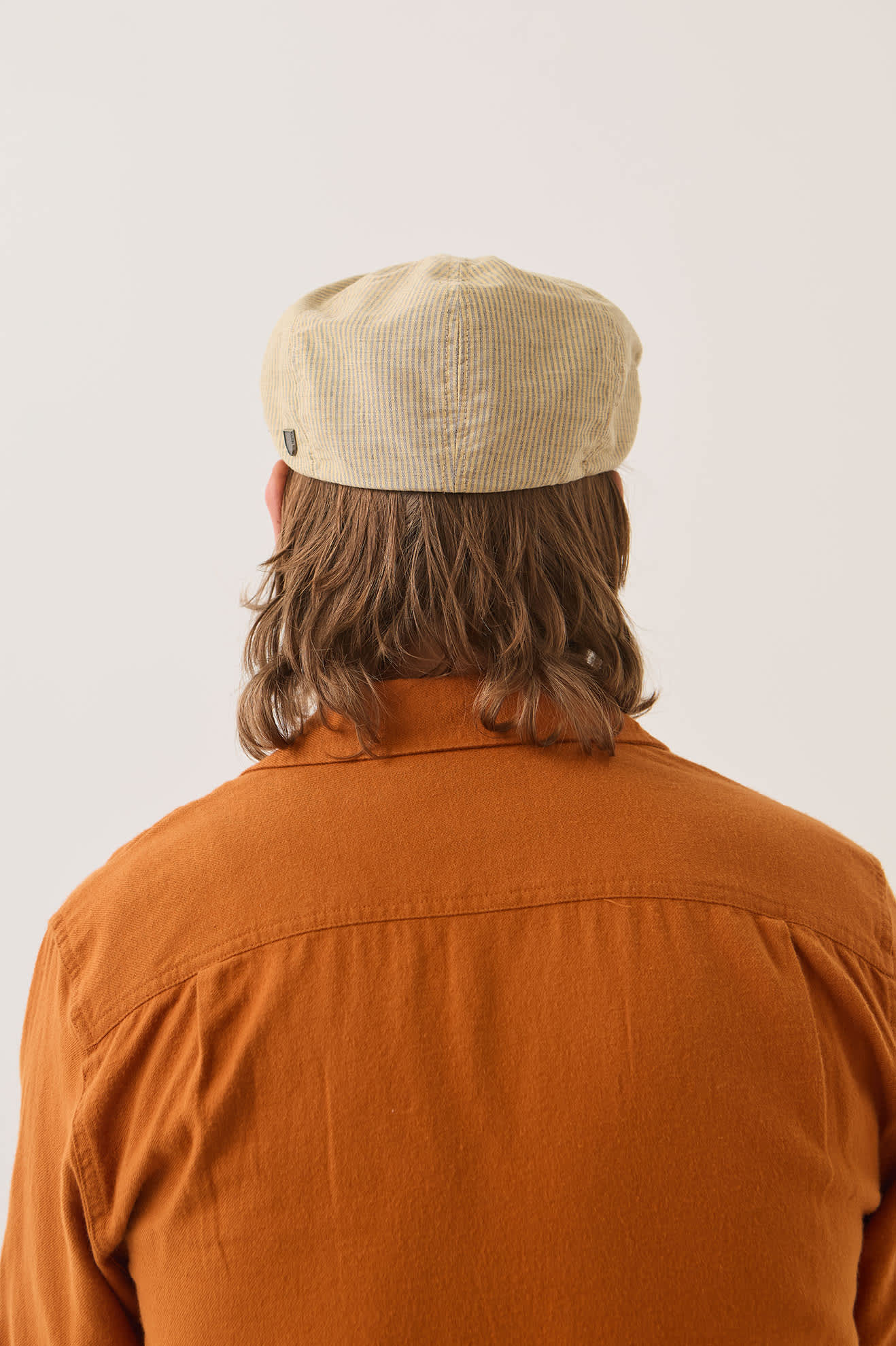 Unisex Hooligan Flat Cap in the color Khaki Stripe/Washed Black - Men's Back View