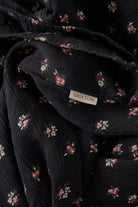 Women's The Molly Silky Dress in the color Black Ditsy Floral - Additional Laydown image