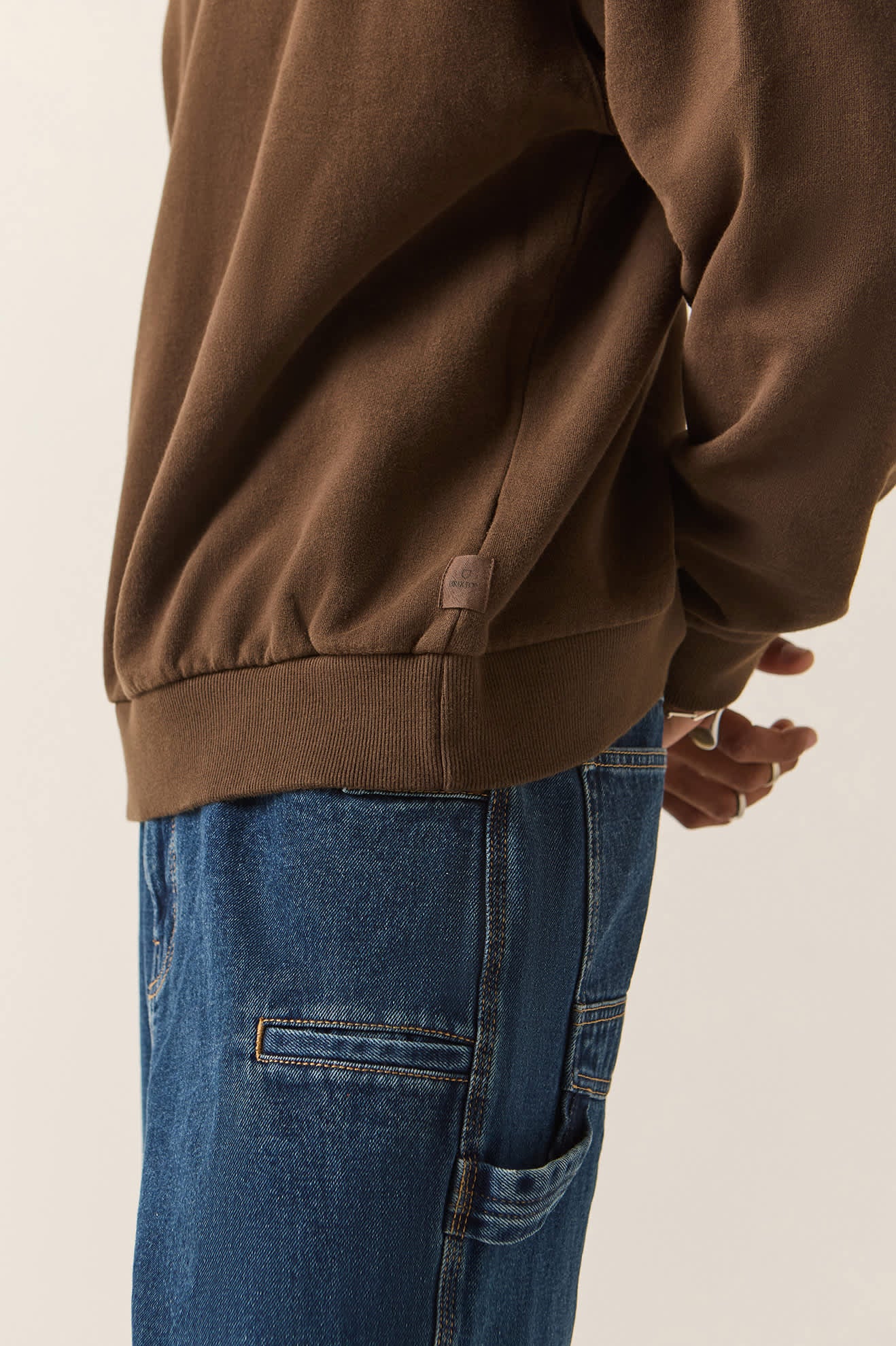 Men's Brixton Baseline Crew Fleece in the color Walnut Brown Vintage Wash - Men's Side View