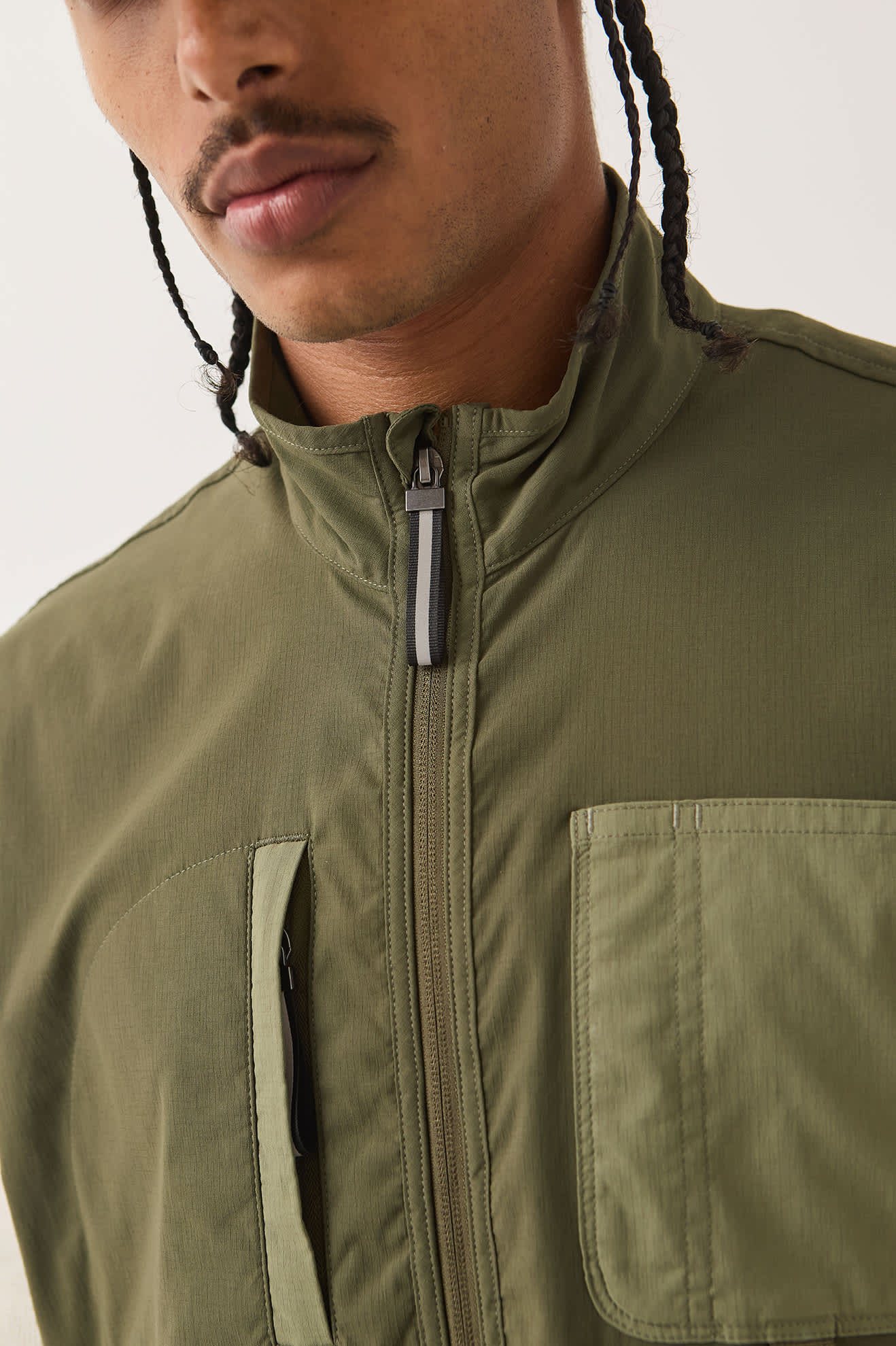 Men's Journey Utility Vest in the color Dark Olive/Olive Surplus - Men's Side View