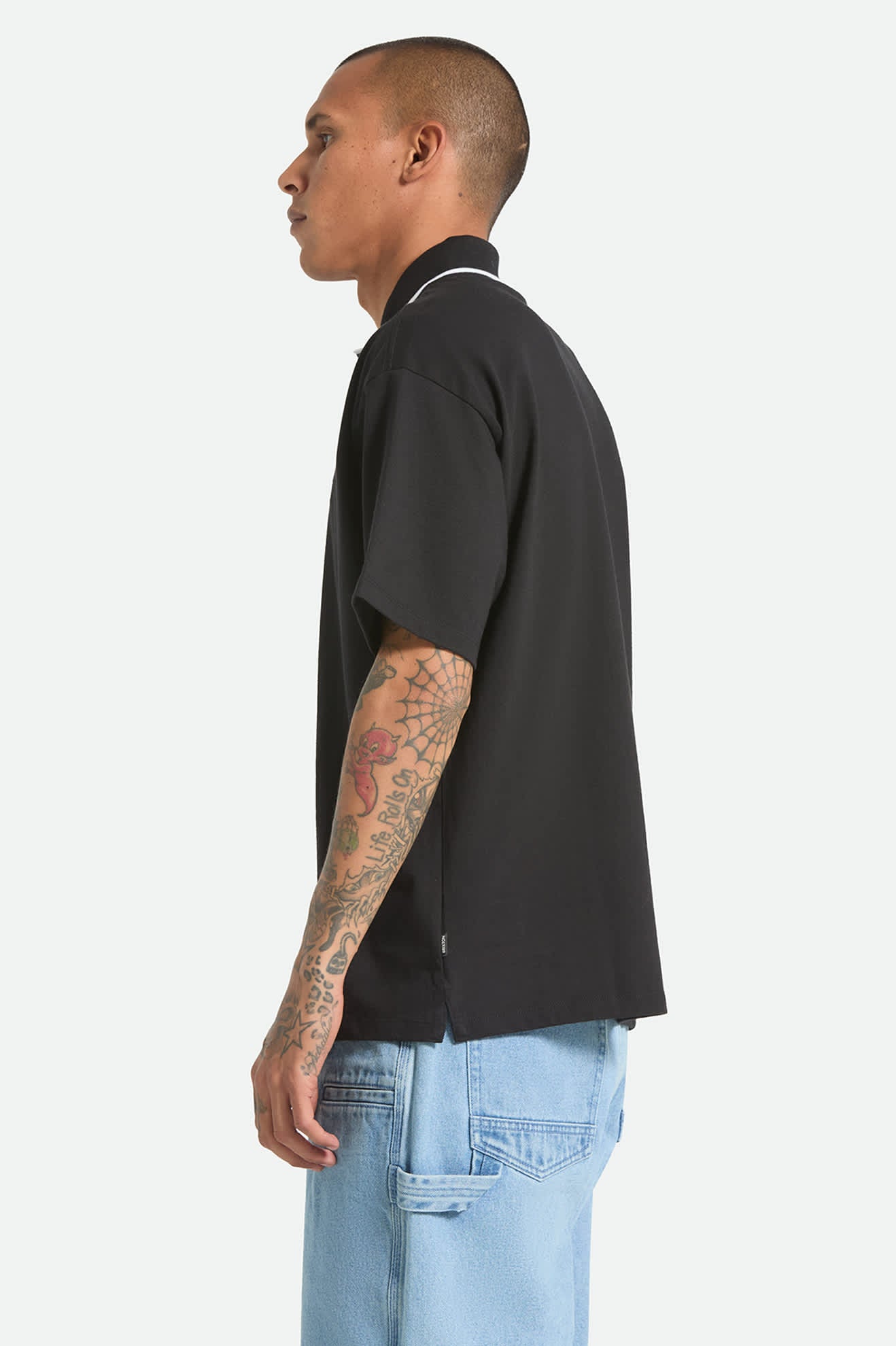 Men's Anton Short Sleeve Polo in the color Black - Men's Side View