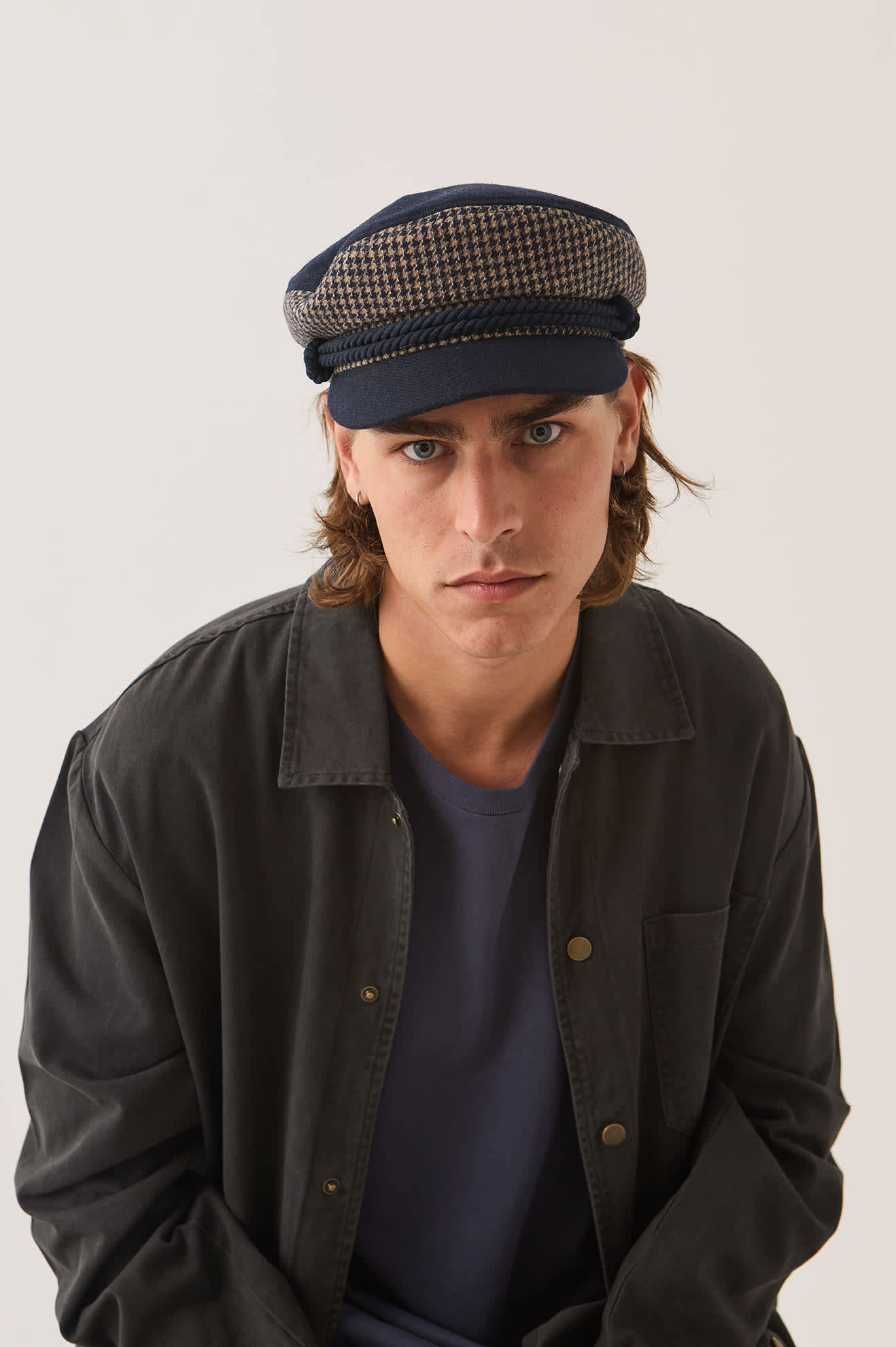 Unisex Fiddler Fisherman Cap in the color Navy/Sand Houndstooth - Men's Front View