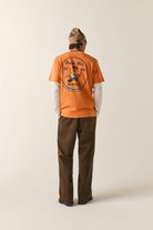 Men's 76 Minute Man Standard T-Shirt in the color Washed Orange - Men's Back View
