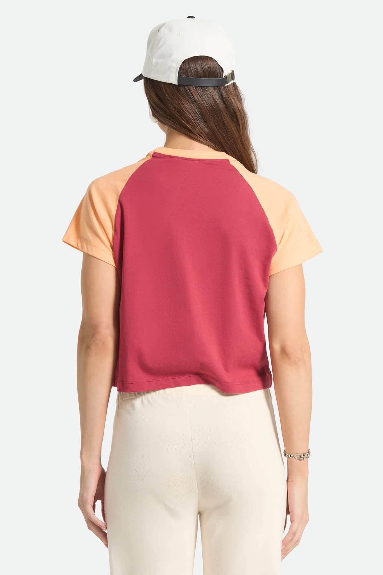 Women's Swallow Sky Cropped Raglan in the color Robust Red/Peach Cobbler - Women's Back View
