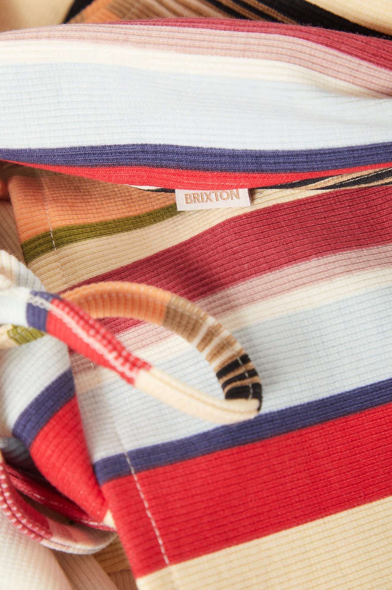 Women's Ribbed Cinch Mini Dress in the color Peach Cobbler Multi Stripe - Additional Laydown image