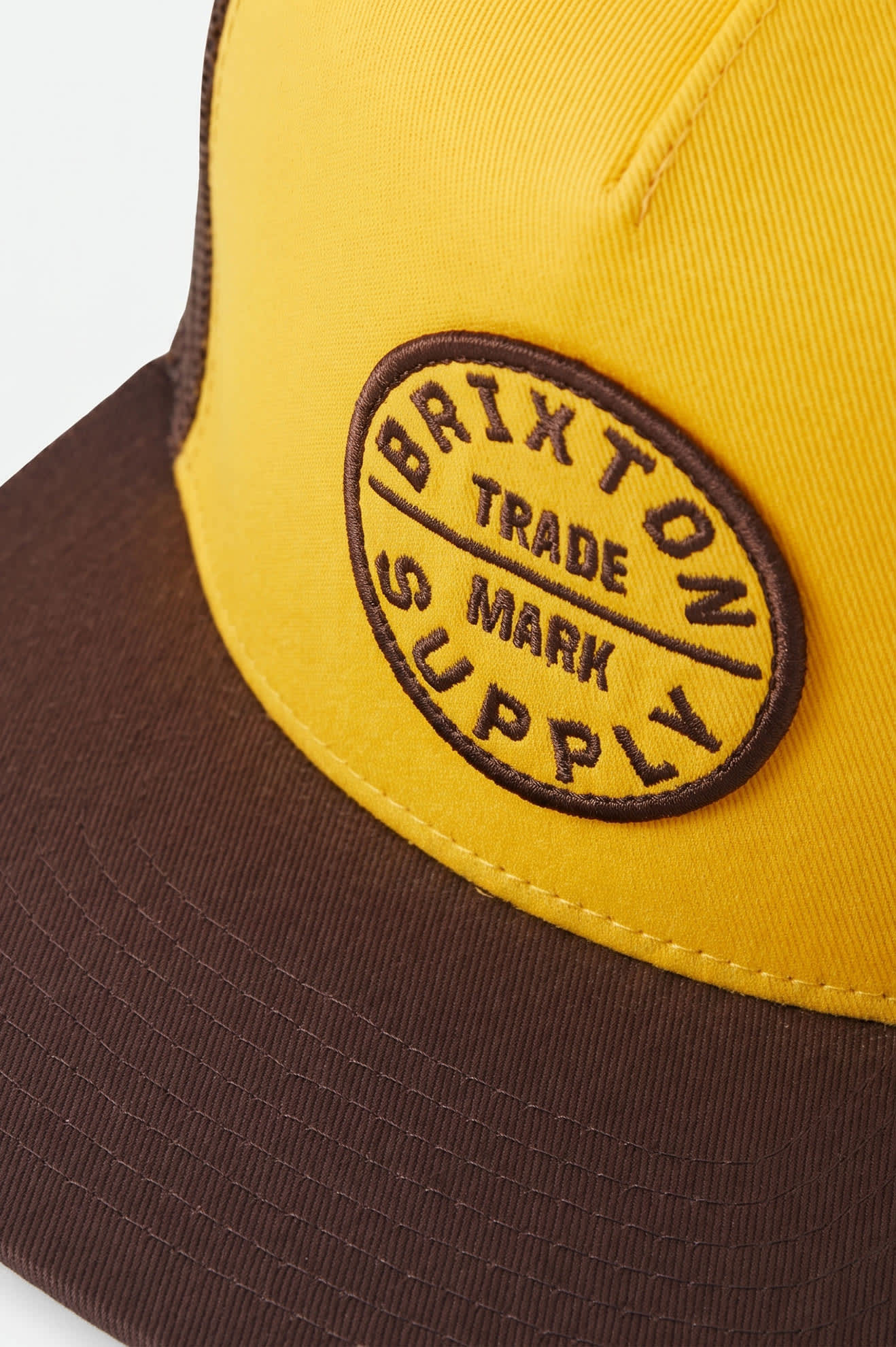 Unisex Oath Trucker Hat in the color Golden Hour/Coco - Additional Laydown image