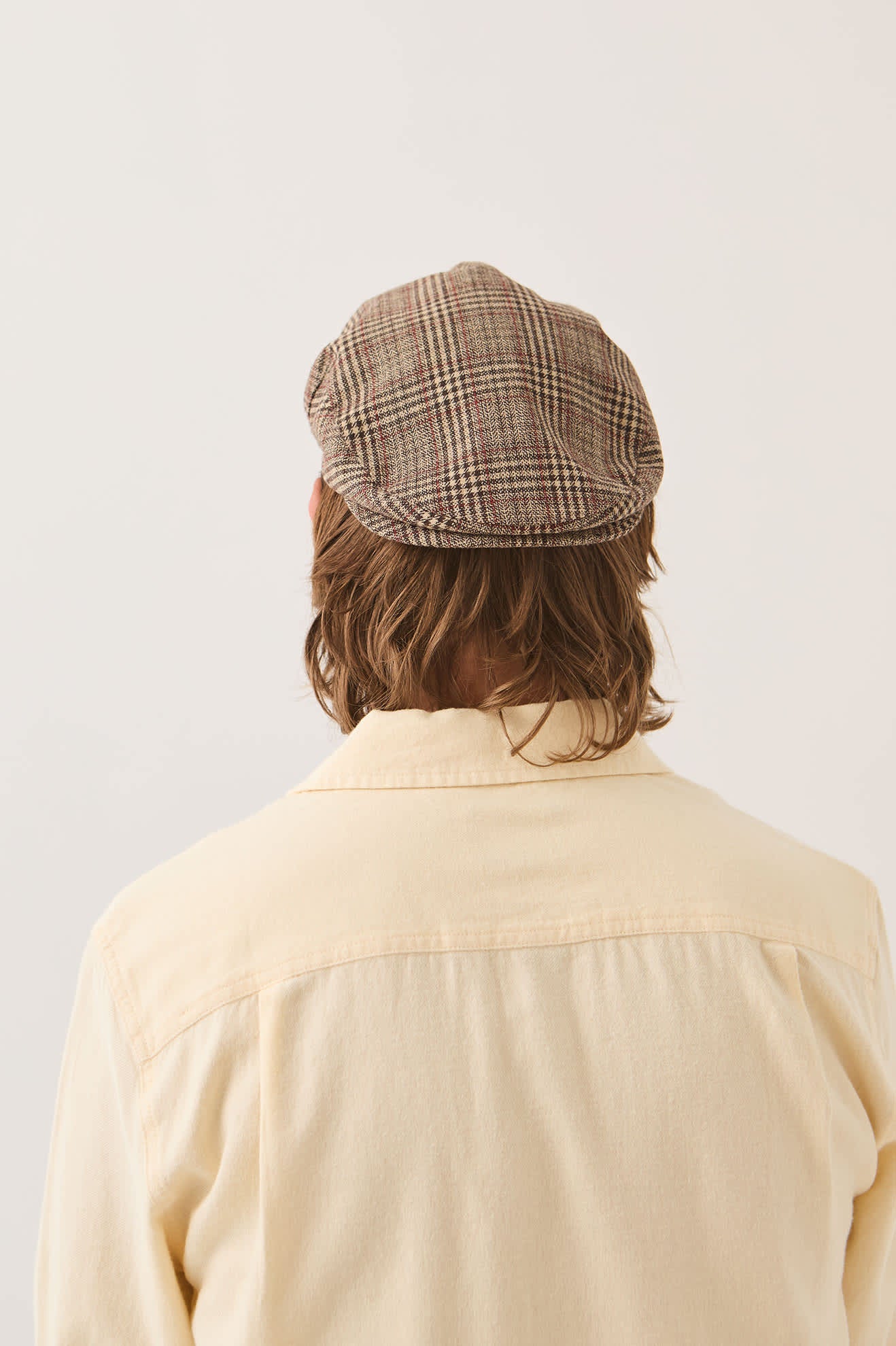 Unisex Hooligan Flat Cap in the color Brown/Tan/Red Plaid - Men's Back View