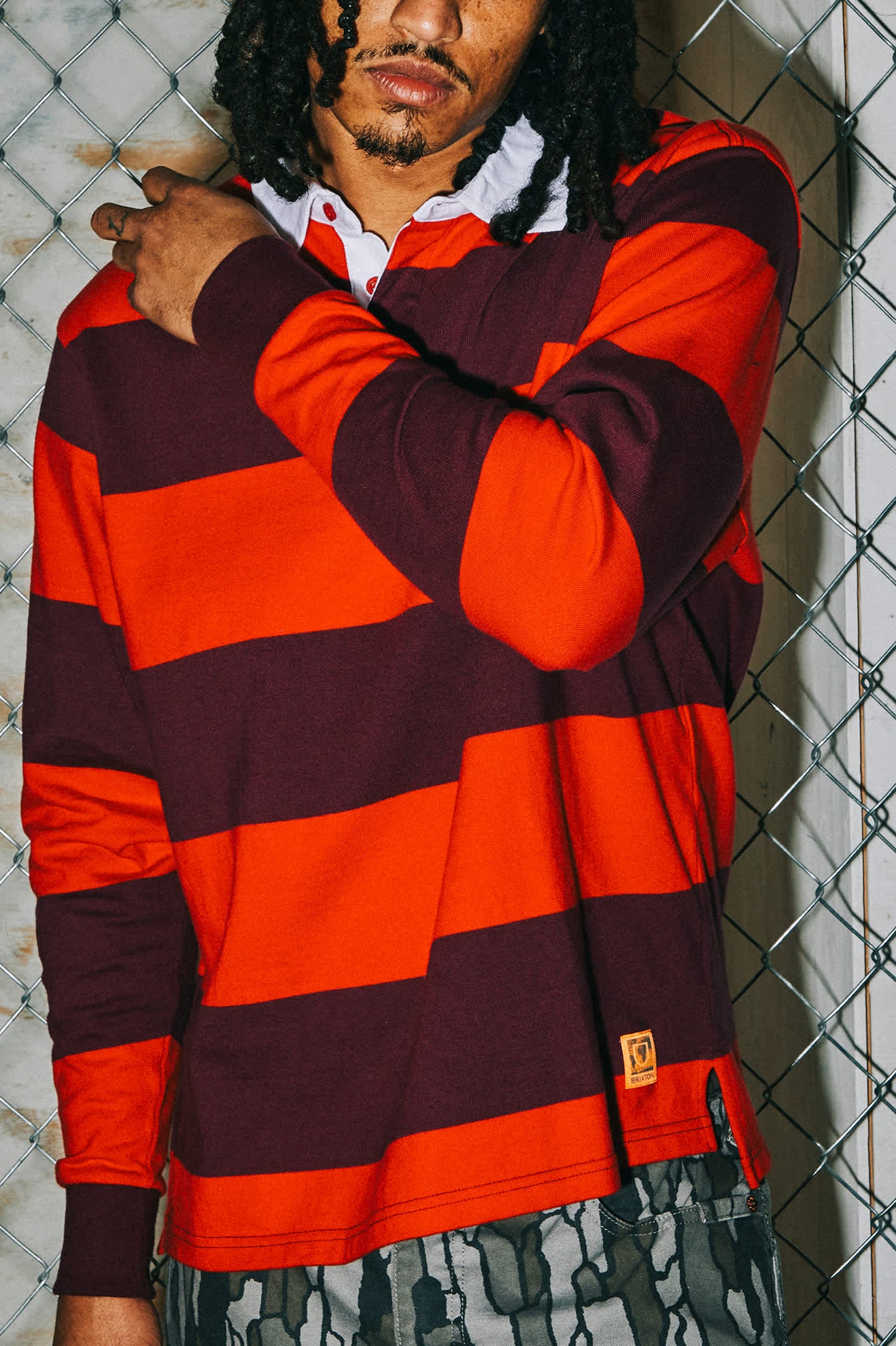 Men's Union Heavyweight Rugby Polo in the color Adrenaline Rush/Port - Men's Lifestyle image