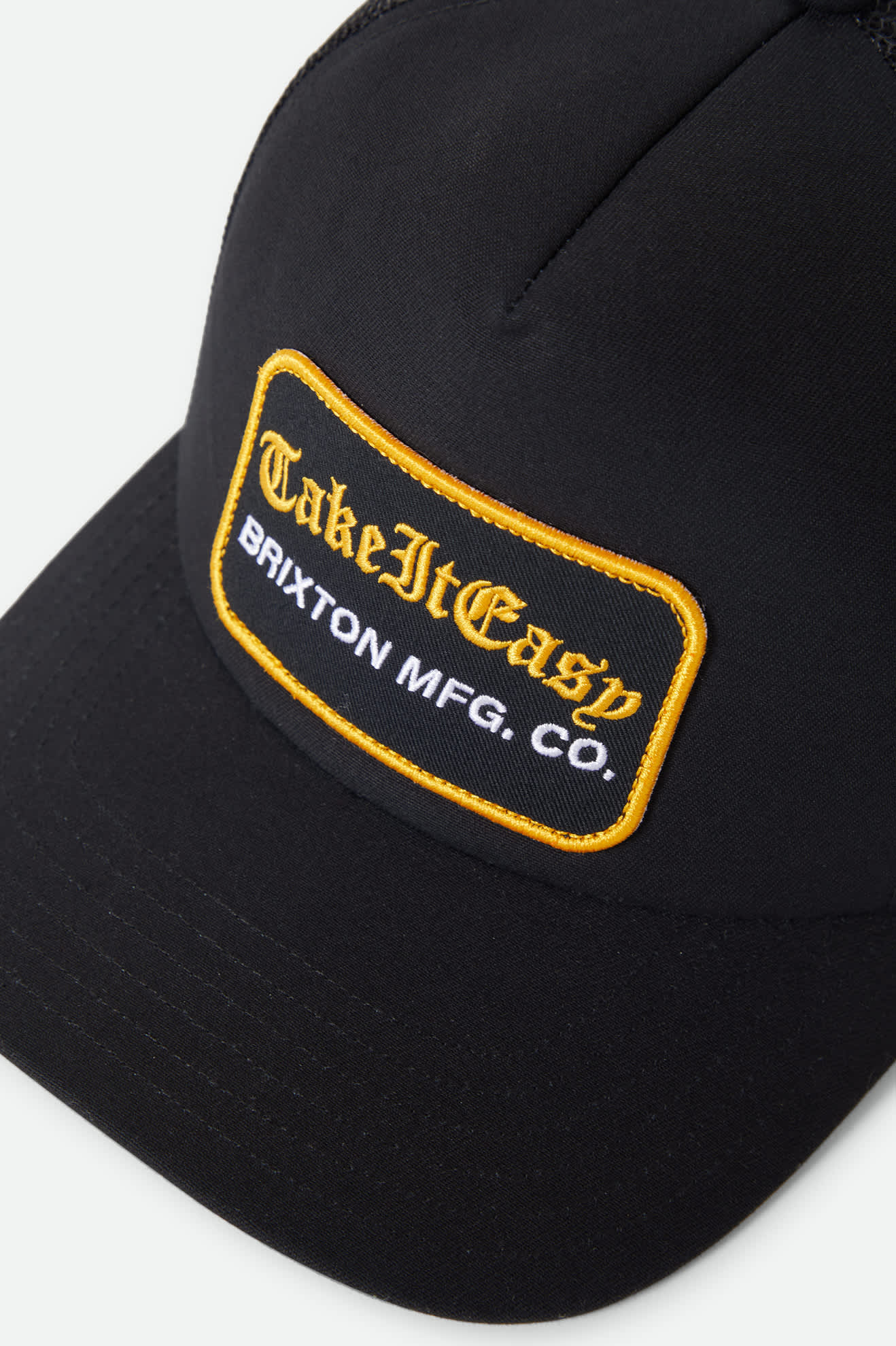 Women's Take It Easy Netplus Trucker Hat in the color Washed Black - Additional Laydown image