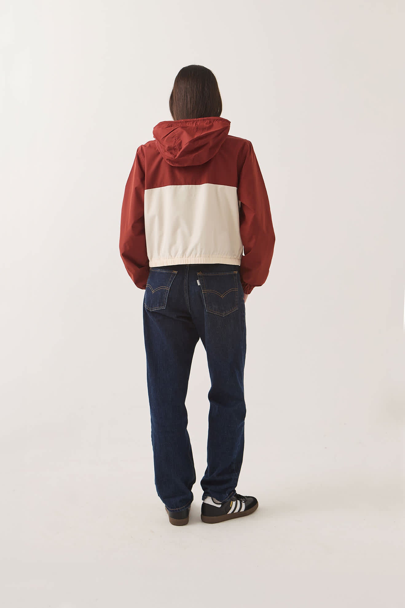 Women's Parsons Lightweight Hooded Windbreaker in the color Dark Brick/Whitecap - Women's Back View