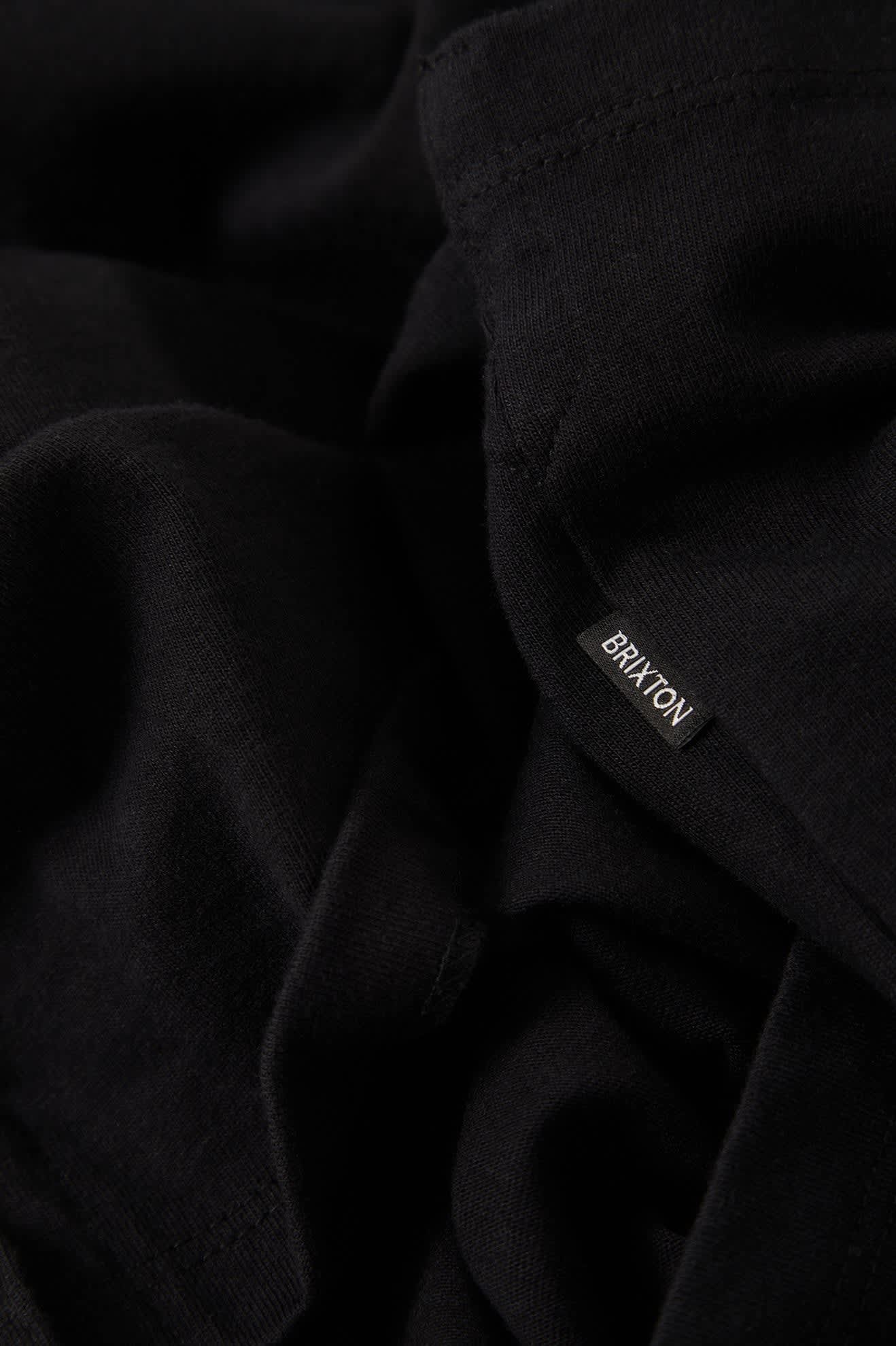 Men's Anton Short Sleeve Polo in the color Black - Additional Laydown image