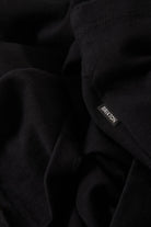 Men's Anton Short Sleeve Polo in the color Black - Additional Laydown image