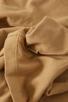 Women's Carefree Organic Garment Dye Slim T-Shirt in the color Khaki - Additional Laydown image