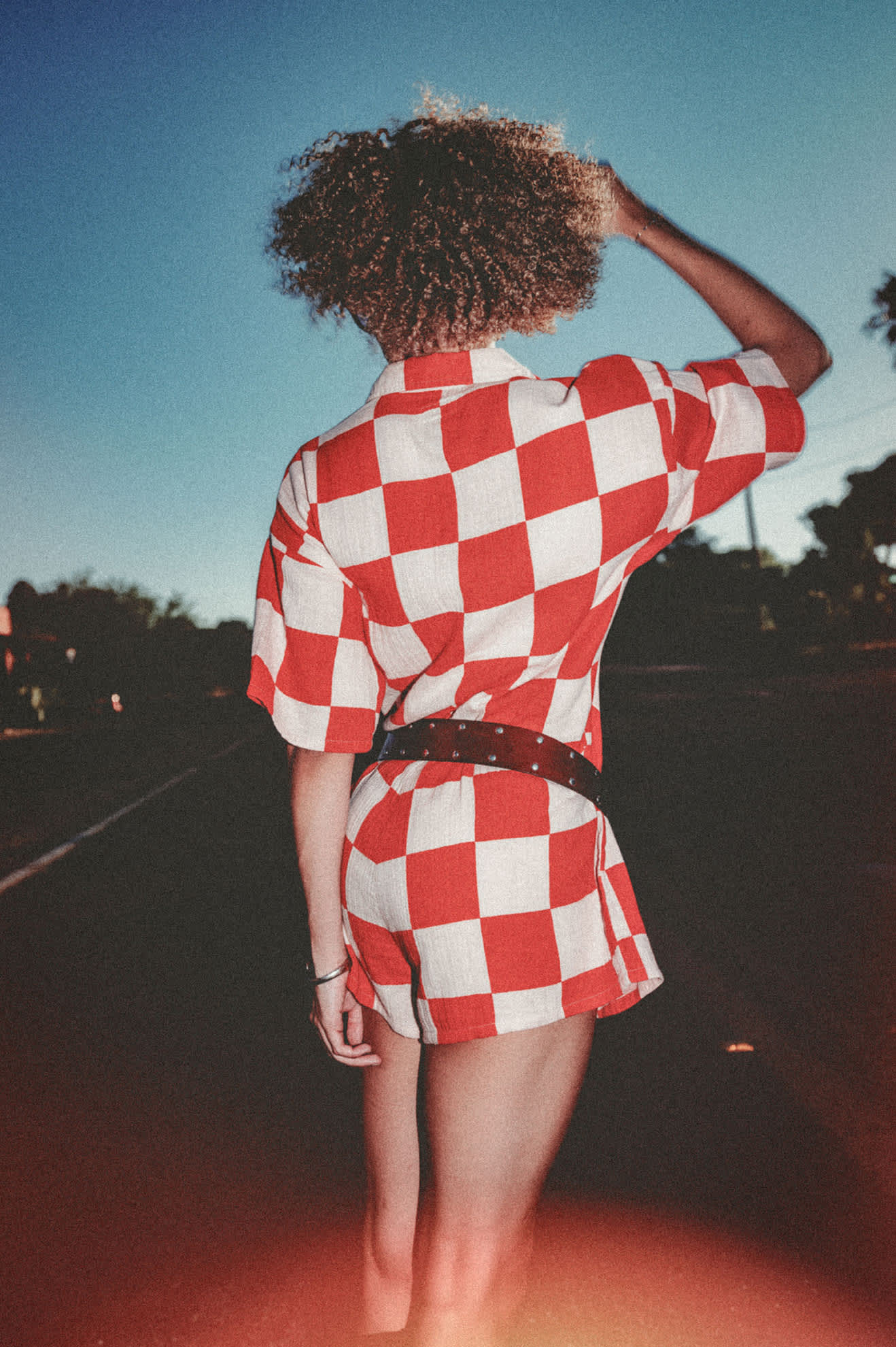 Women's The Getaway Romper in the color Silver Pink/Adrenaline Rush Checkerboard - Women's Lifestyle image