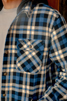 Men's Bowery Quilited Hooded Flannel in the color Navy/Cream - Men's Lifestyle image