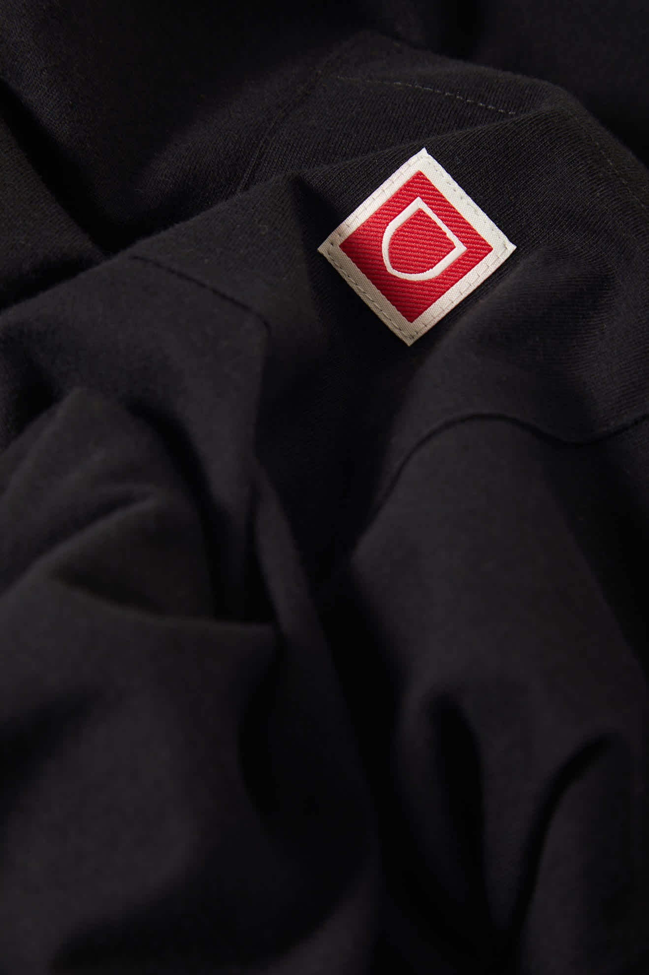 Men's Beta Sheild Short Sleeve Pocket T-Shirt in the color Black - Additional Laydown image