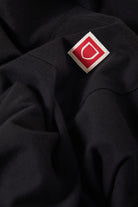 Men's Beta Sheild Short Sleeve Pocket T-Shirt in the color Black - Additional Laydown image