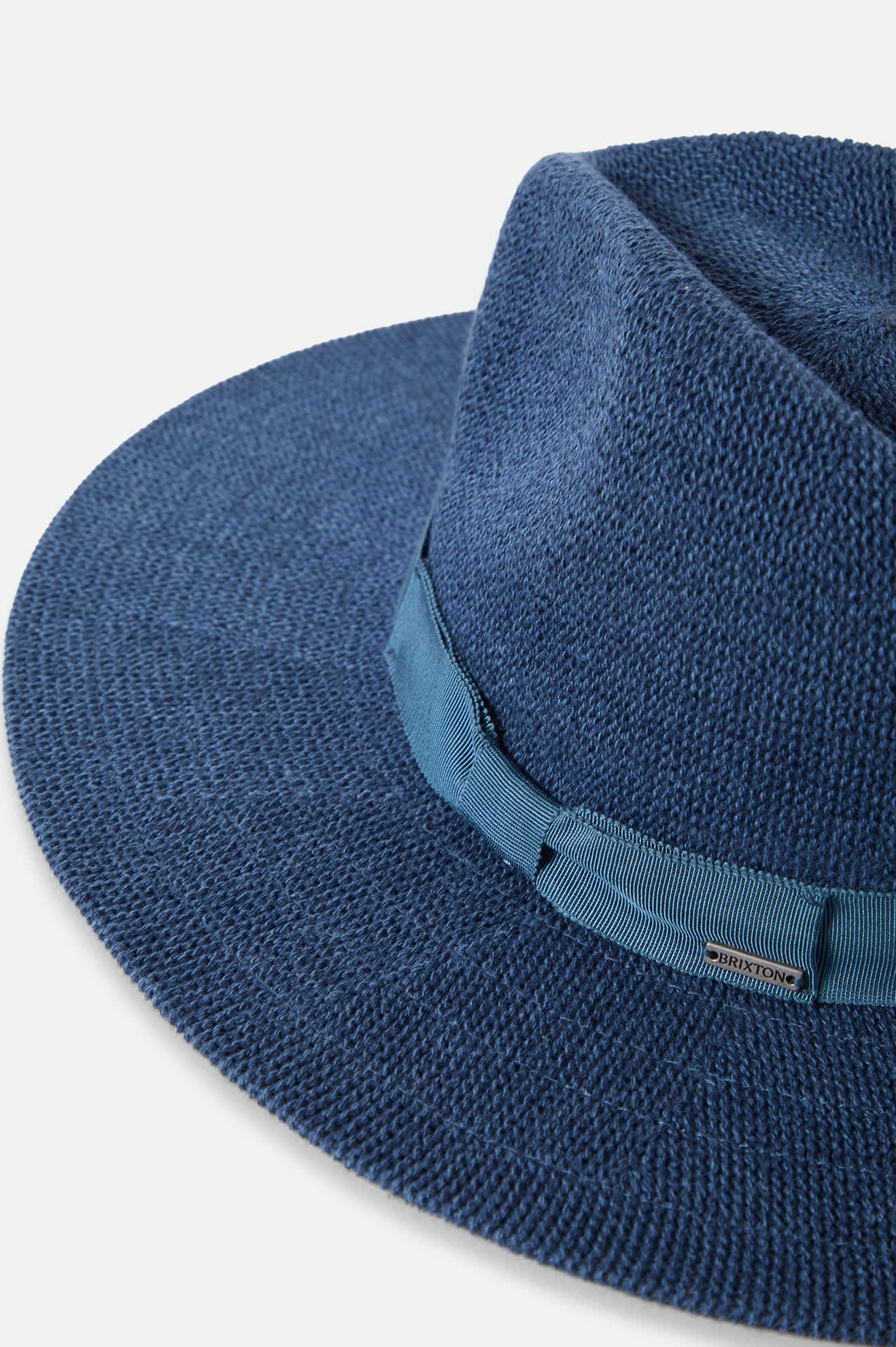 Women's Lyons Knit Packable Hat in the color Midnight Blue - Additional Laydown image