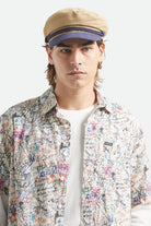 Unisex Fiddler Fisherman Cap in the color Sand/Washed Navy - Men's Front View