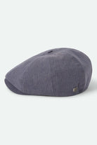 Unisex Brood Newsboy Cap in the color Indigo/Dark Sand - Additional Laydown image