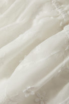 Women's The Abigail Tie Top in the color Off White Floral - Additional Laydown image