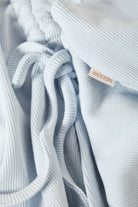 Women's Ribbed Cinch Mini Dress in the color Blue Aura - Additional Laydown image